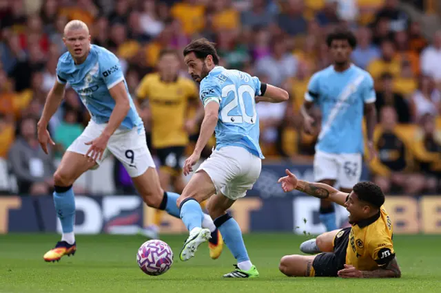 Joao Gomes of Wolverhampton Wanderers reacts as Bernardo Silva