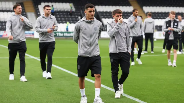 Hearts players at St Mirren's ground