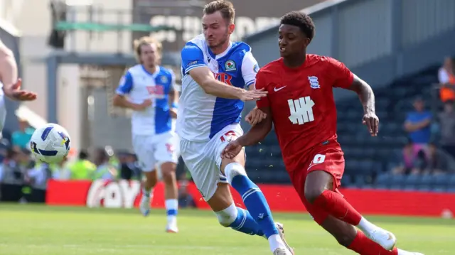Blackburn Rovers Ryan Hedges Birmingham City's Demarai Gray battle for the ball