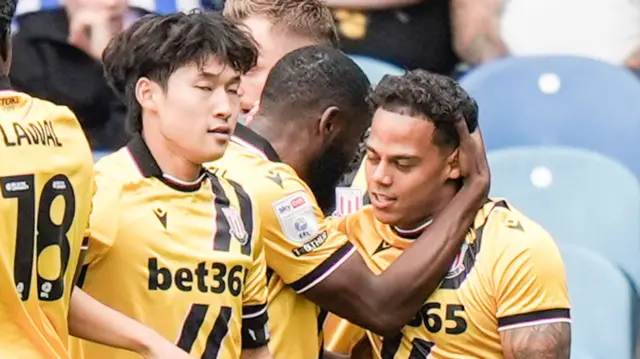 Stoke City's Million Manhoef (right) celebrates