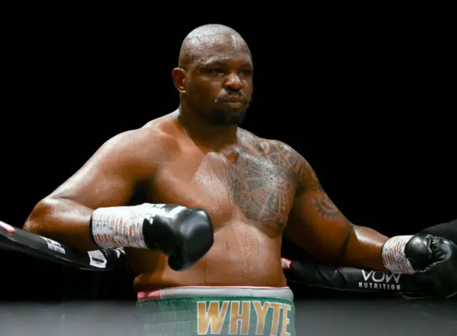 Dillian Whyte standing in the corner of a boxing ring