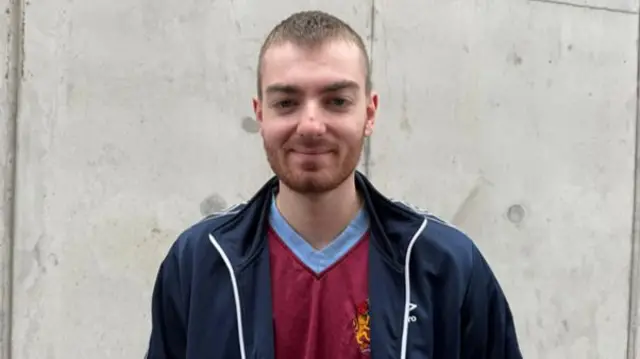 Burnley fan, Ash Speight poses
