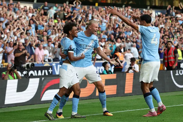 Haaland, Bobb and Reijnders celebrate the first City goal of the game