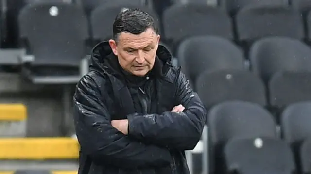 A downcast looking Preston boss Paul Heckingbottom