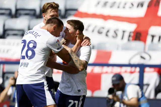 Preston North End's Alfie Devine (right) celebrates scoring