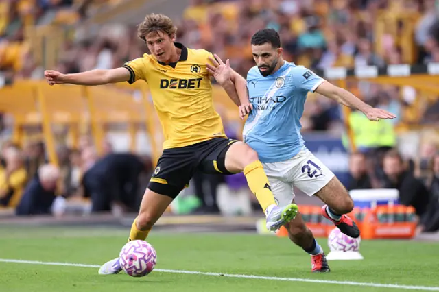 Fer Lopez of Wolverhampton Wanderers under pressure from Rayan Ait-Nouri