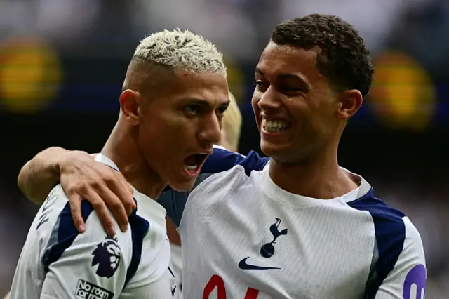 Richarlison (L) celebrates with Tottenham Hotspur's Welsh forward Brennan Johnson