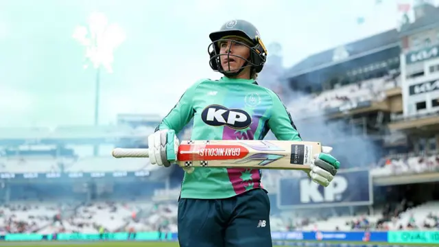 Lauren Winfield-Hill of Oval Invincibles walks out