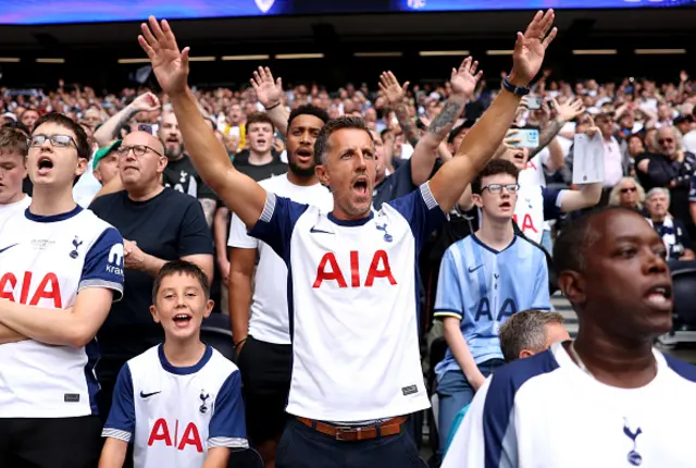 Fans enjoy the atmosphere inside the stadium