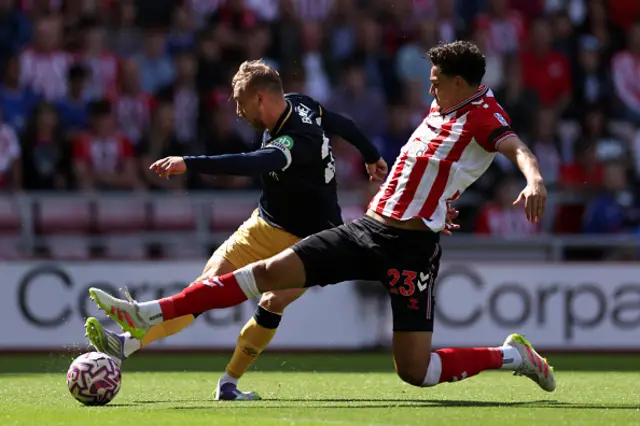 Jarrod Bowen of West Ham United shoots under pressure