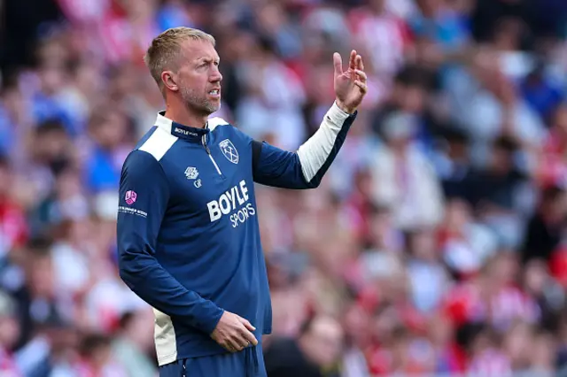 Graham Potter looks on