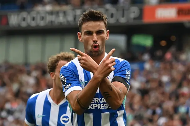 Matt O'Riley celebrates