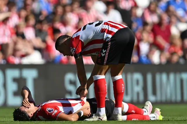 Sunderland's Swiss midfielder Granit Xhaka (R) checks on Sunderland's Dutch defender Jenson Seelt