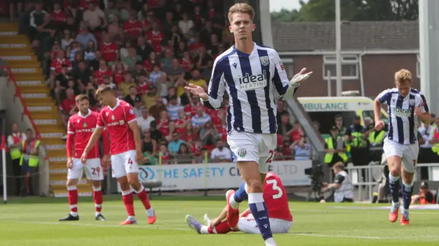 Isaac Price celebrates scoring at Wrexham
