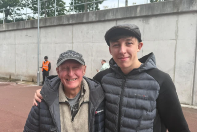 Mark Wilson and Leighton Wilson, pose for a picture