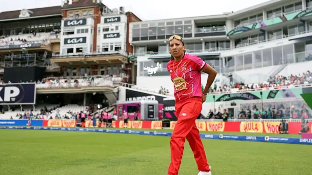 Shabnim Ismail of Welsh Fire walks out to field