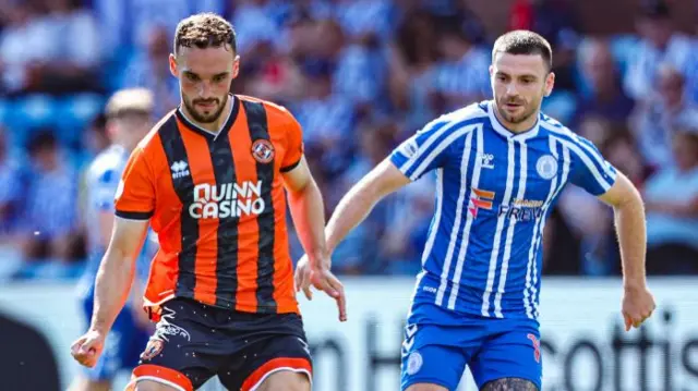 Dundee United's Vicko Sevelj and Kilmarnock's Greg Kiltie