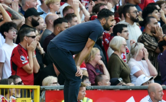 Manchester United manager Ruben Amorim looks on