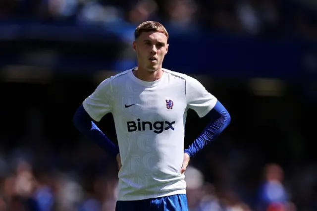 Cole Palmer of Chelsea warms up