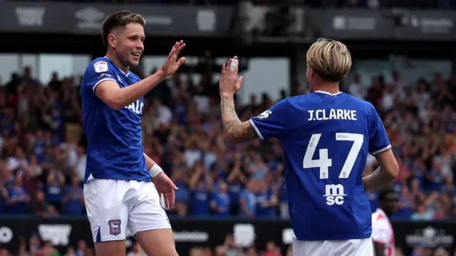 Jack Clarke of Ipswich Town celebrates with teammate George Hirst (left)