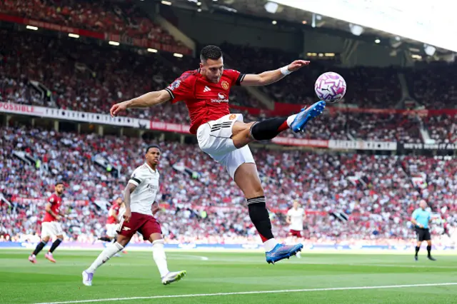 Diogo Dalot of Manchester United shoots in the air