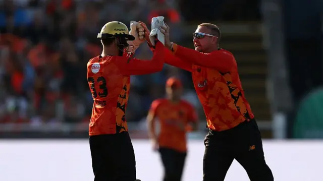 Liam Livingstone of Birmingham Phoenix celebrates with team mate Joe Clarke