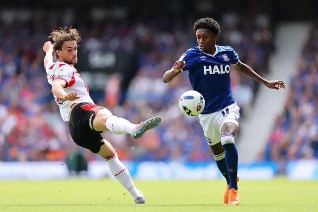 Taylor Harwood-Bellis of Southampton battles for possession with Jaden Philogene of Ipswich Town