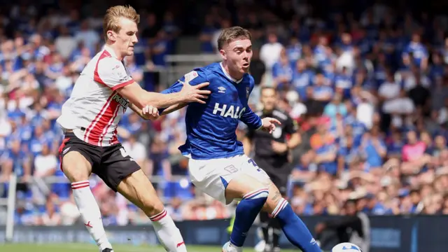 Leif Davis of Ipswich Town in action against Flynn Downes of Southampton