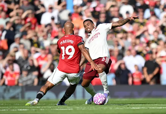 Bryan Mbeumo of Manchester United battles for possession with Gabriel