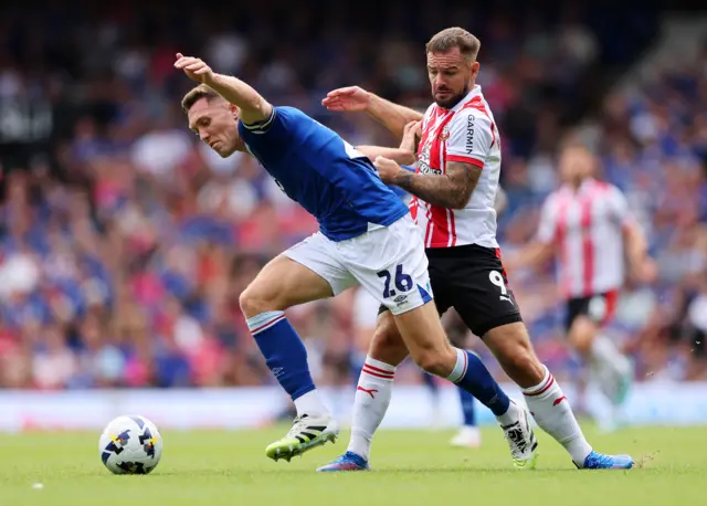 Dara O'Shea of Ipswich Town is challenged by Adam Armstrong of Southampton