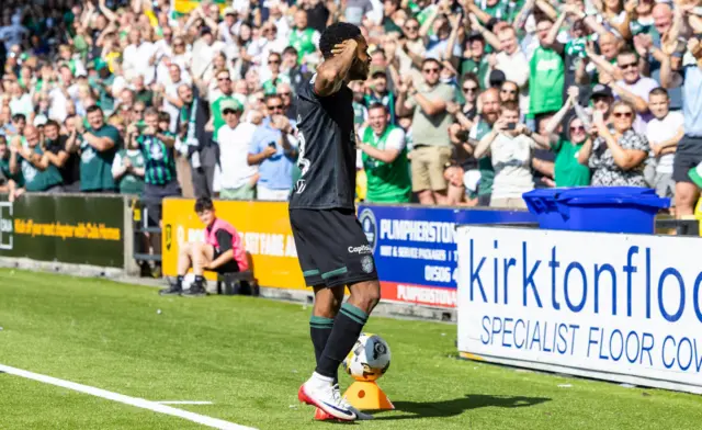 Thibault Klidje soaks up the acclaim of a large away support