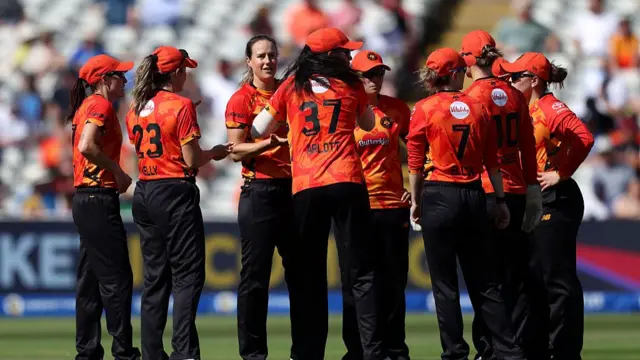Ellyse Perry of Birmingham Phoenix celebrates with team mates