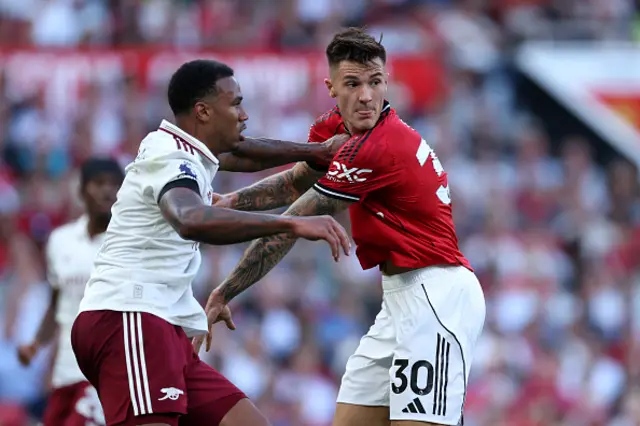 Benjamin Sesko of Manchester United is challenged by Gabriel