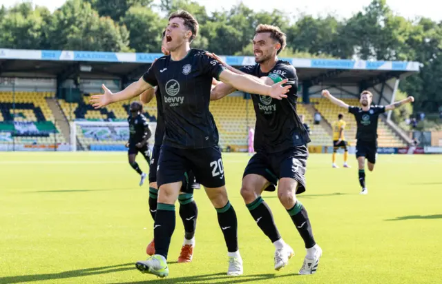 Josh Mulligan celebrates making it 2-0 after 87 minutes