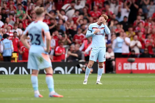 Sepp van den Berg of Brentford looks dejected after Chris Wood of Nottingham Forest (not pictured) scores