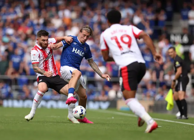 Ipswich Town's Jack Clarke and Southampton's Ryan Manning battle for the ball