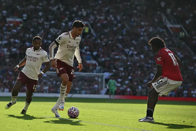 Kai Havertz (2L) vies with Manchester United's Danish defender  Patrick Dorgu