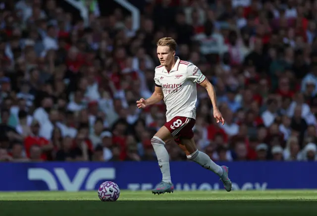 Martin Odegaard of Arsenal runs with the ball