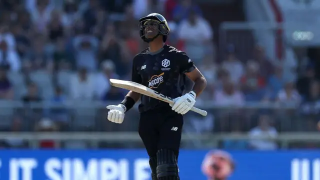 Rachin Ravindra of Manchester Originals reacts after being bowled by Matthew Potts