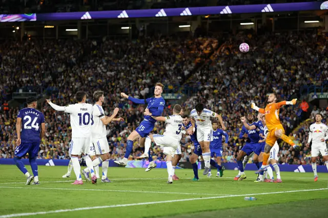Jake O'Brien of Everton heads the ball in the box
