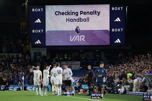 The big screen displays the VAR