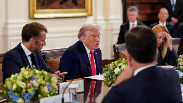 Donald Trump speaks to European leaders at the White House