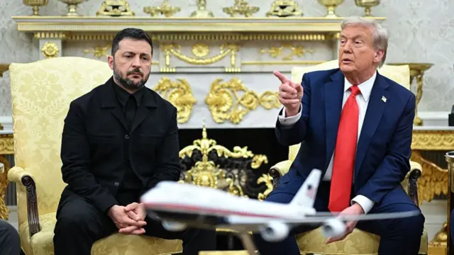 Ukrainian President Volodymyr Zelensky and US President Donald Trump participate in a meeting in the Oval Office of the White House