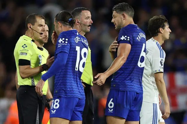 Jack Grealish and Everton's English defender #06 James Tarkowski have words with the officials