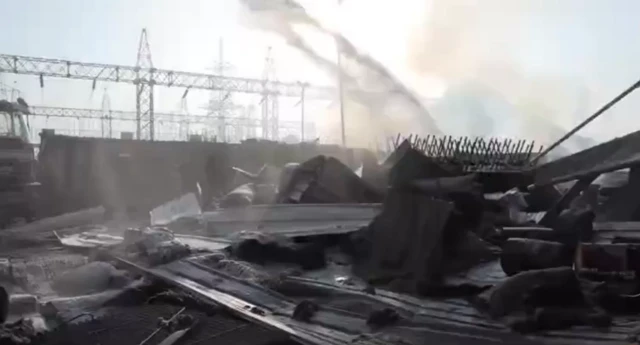 Rubble in front of a power plant