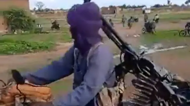 The footage includes a shot of this fighter with a machine gun attached to his motorbike