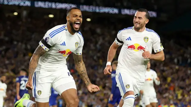 Lukas Nmecha and Jack Harrison celebrate