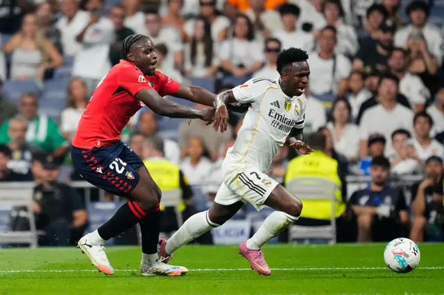 Vinicius Jr being pushed in the back