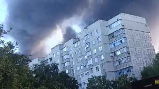 Plumes of smoke above residential blocks