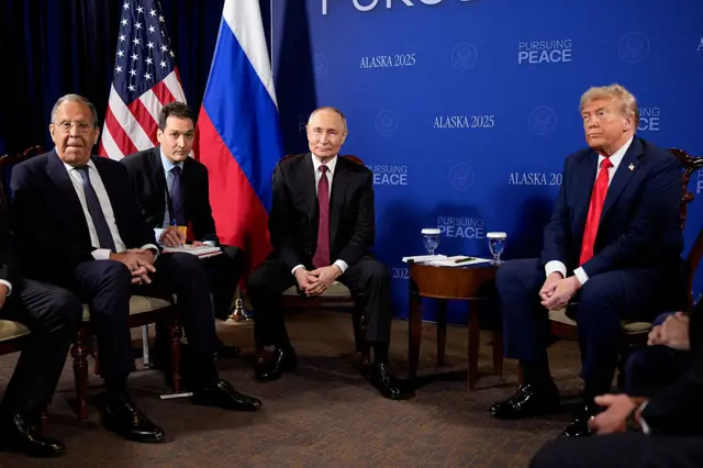 Donald Trump and Vladimir Putin hold a meeting at Joint Base Elmendorf-Richardson on 15 August 2025 in Anchorage, Alaska. Also pictured is Russian Minister of Foreign Affairs Sergey Lavrov, on the far left..